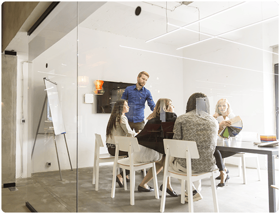 team-having-a-meeting-in-glass-meeting-room